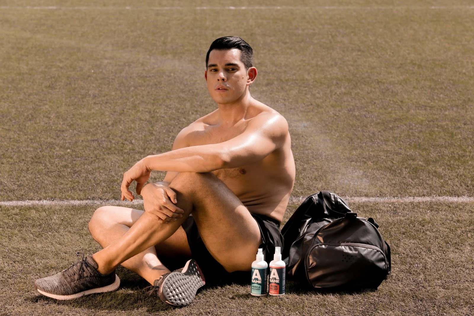 Athlete with A-Game sprays and a gym bag during the 2018 Mond campaign