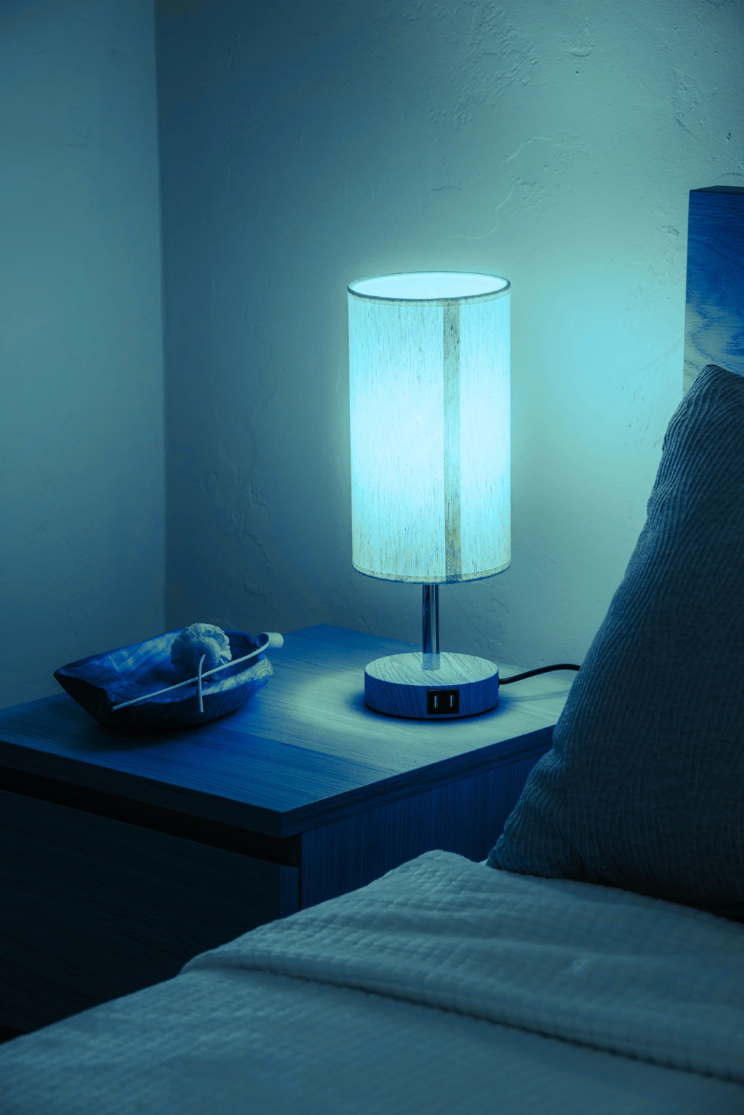 An evening bedside scene from the A-Game Labs campaign